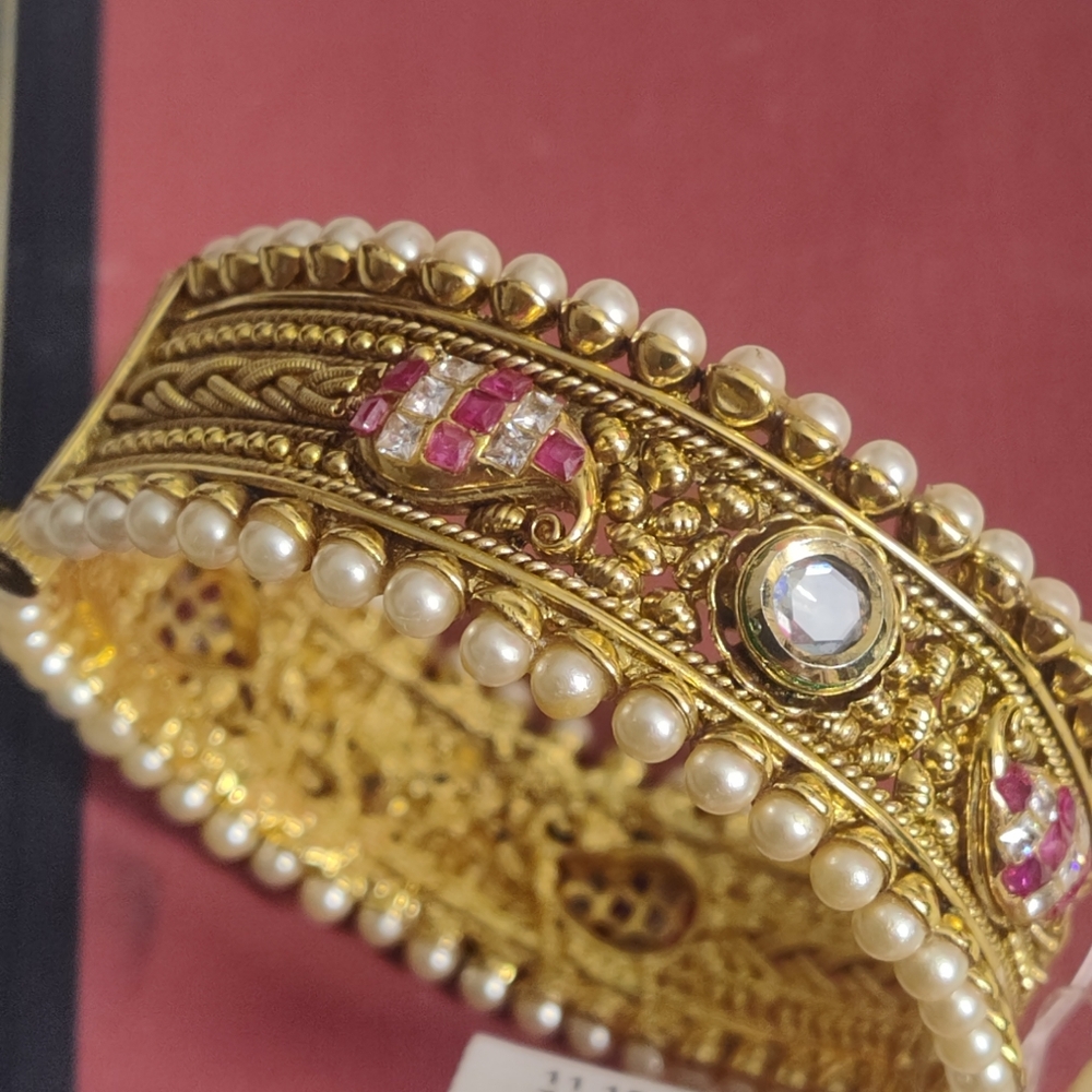 Gold tone Adorned Bracelet with Rhinestones and Pearl accents. NWT 7"